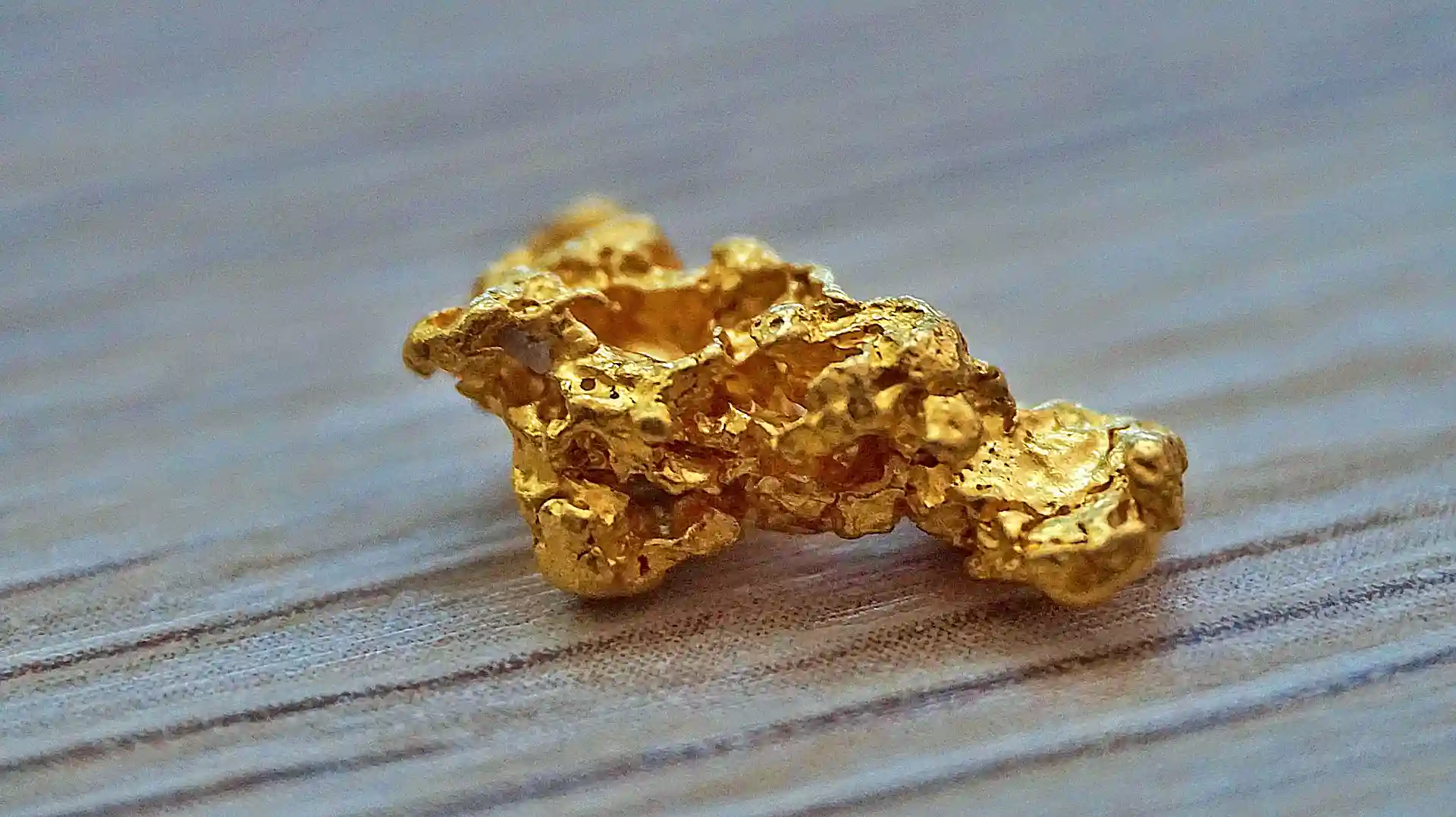 Harga emas naik 1,3 persen menjadi USD4.077,64 per troy ounce. (Foto: KabarBursa)